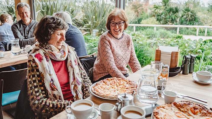 Lunch in the Kingfisher Kitchen - visitors enjoying pizza